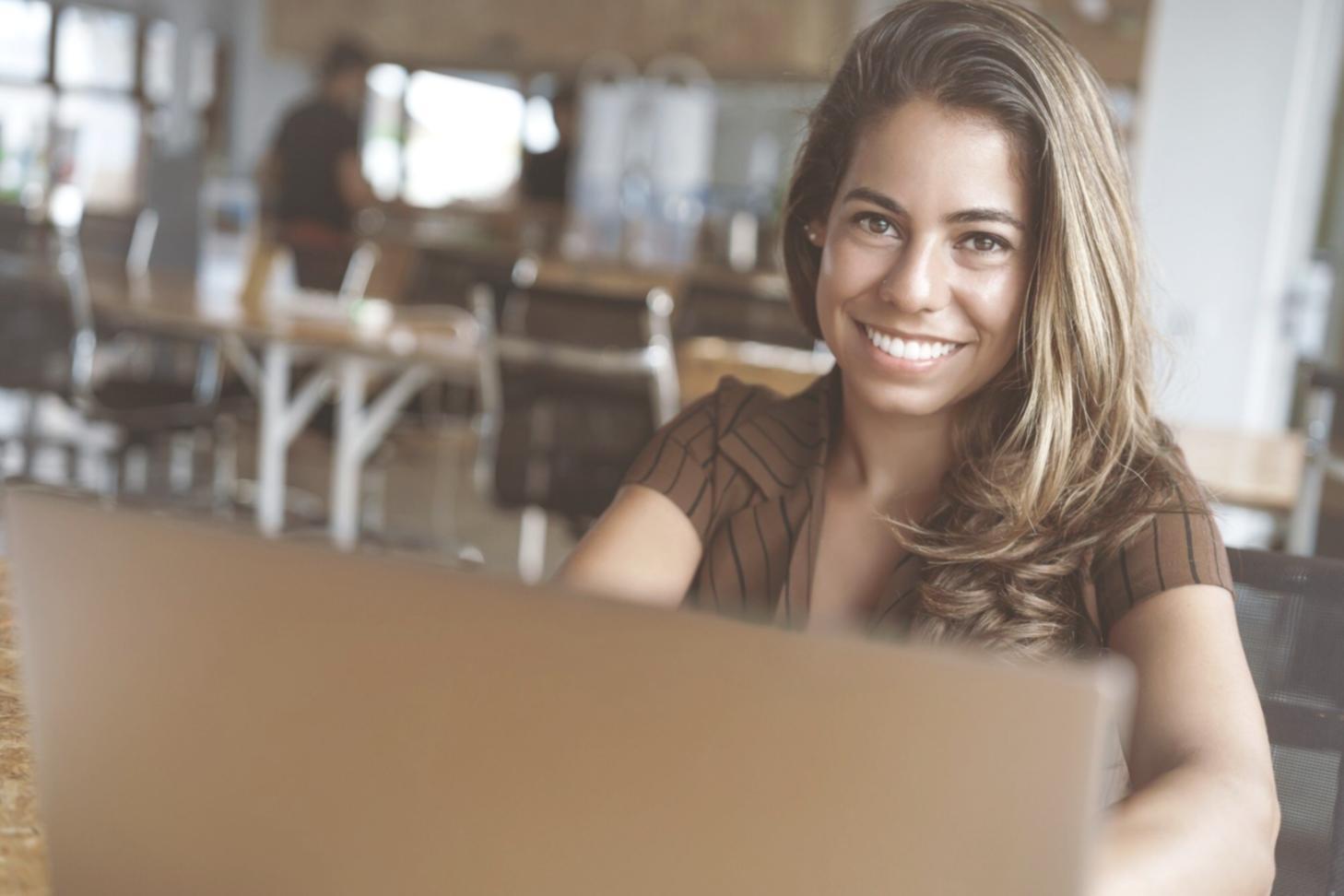 Blockchain development workspace showing coding environment and cryptocurrency charts